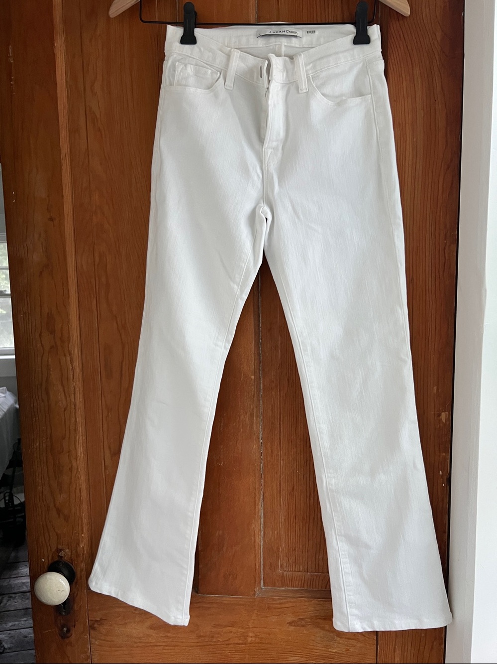 I Brand white slight boot flare amazing ! 25 dry cleaned .